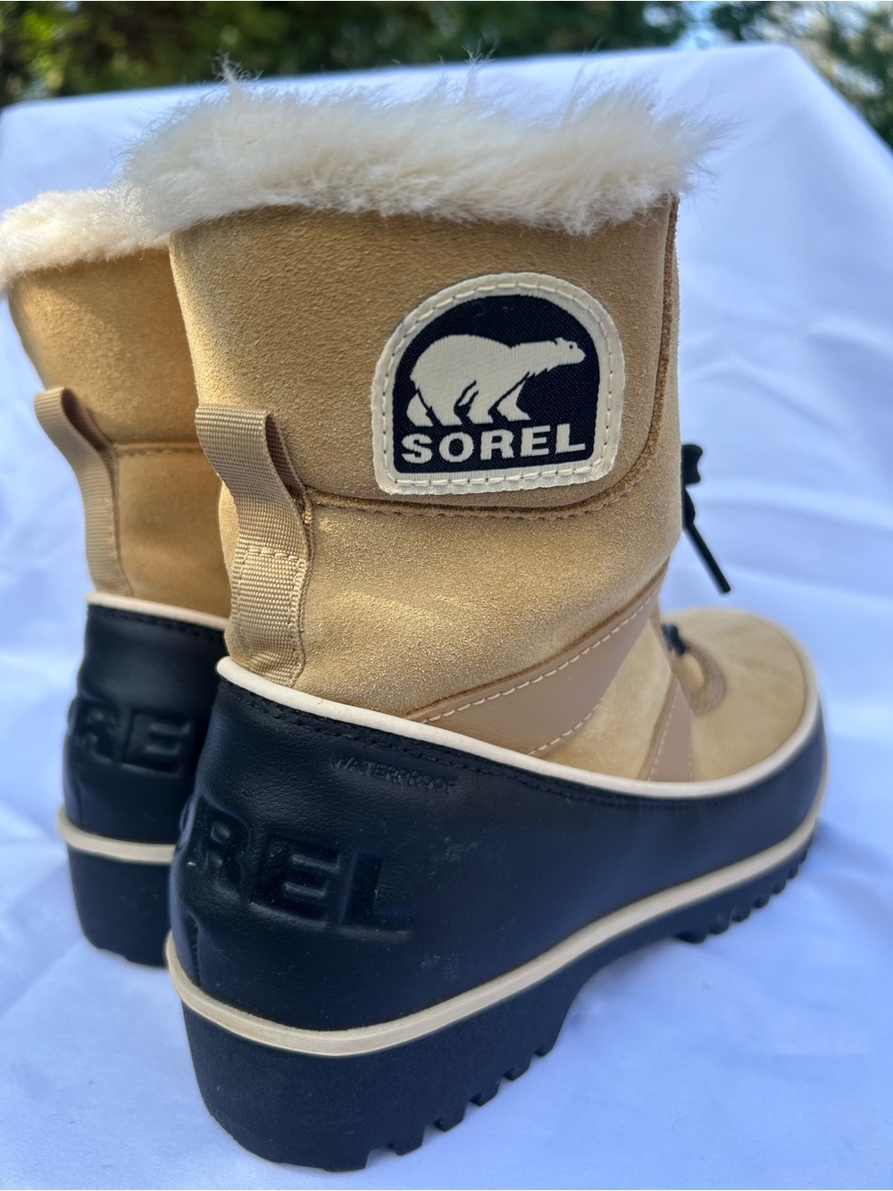 Sorel Women’s Tan and Black Faux-Fur Snow Boots